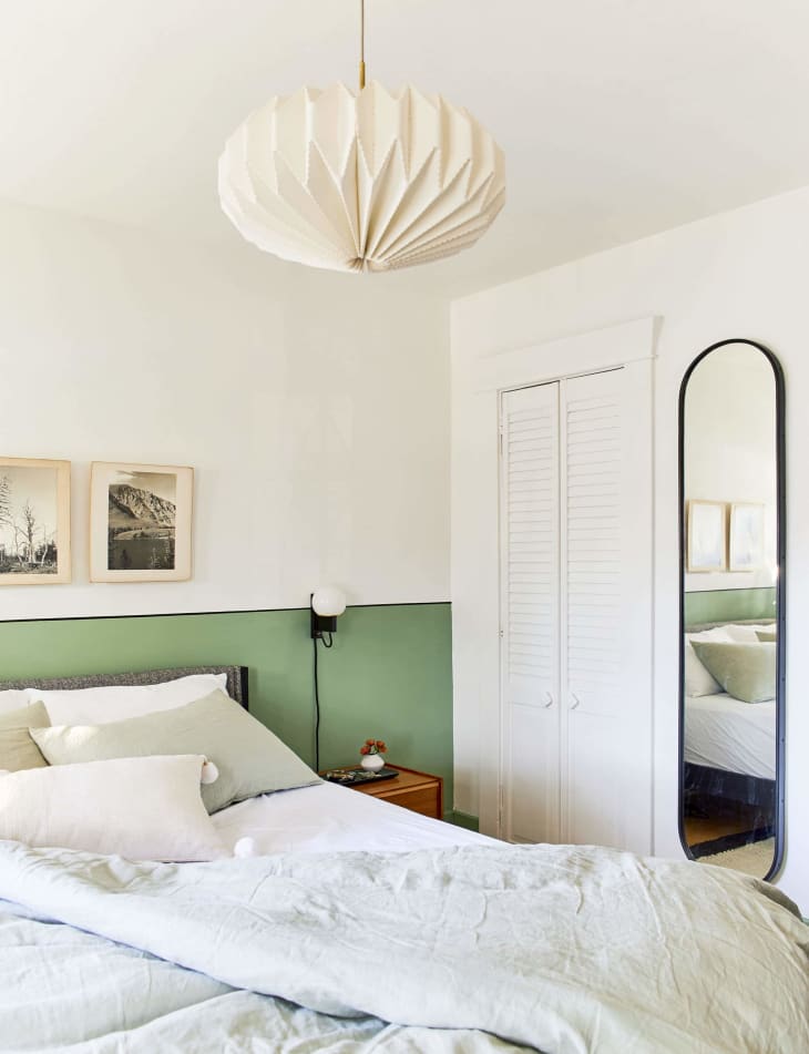 Julie Rose wall-to-wall wainscoting behind the headboard