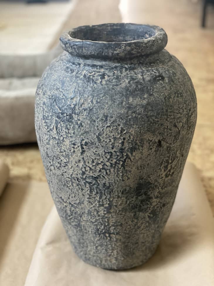 DIY vase Erika Espiritu made out of mud, water, and spray paint