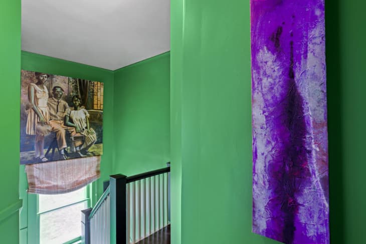 Green and purple color combination in an stair hall