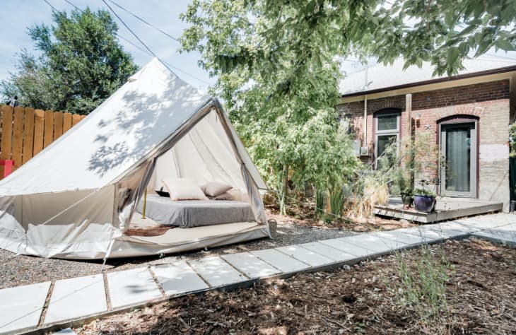 Glamping tent outside at a home designed by The Sursy