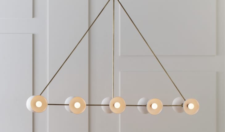 Apparatus Trapeze 10 Light in brass and white