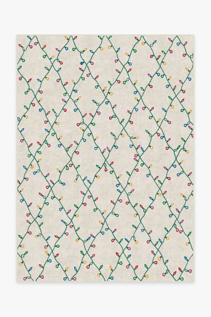 Christmas lights that look like a trellis pattern on a washable rug