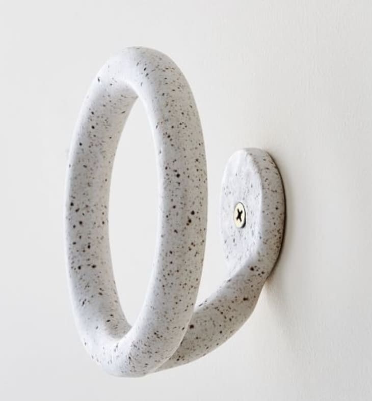 Wall hook with a speckle pattern from Sin