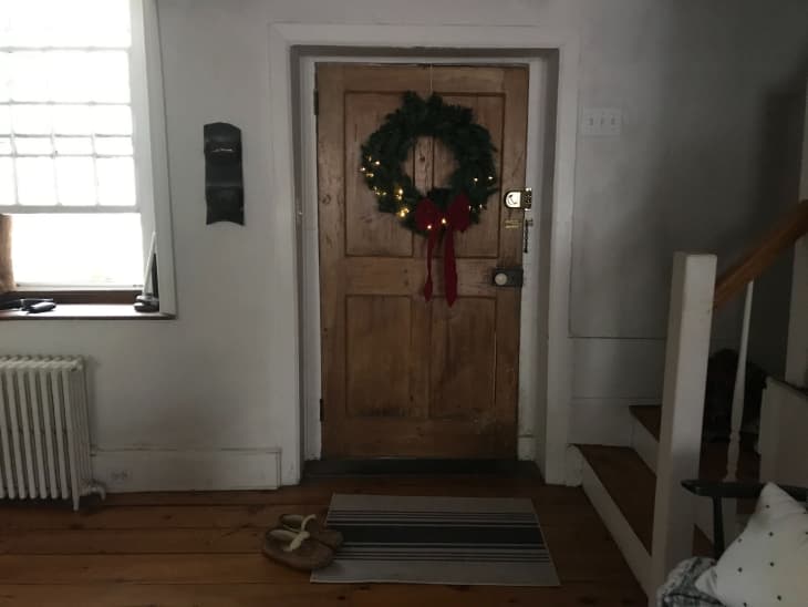 Wreath hung on the inside of a door