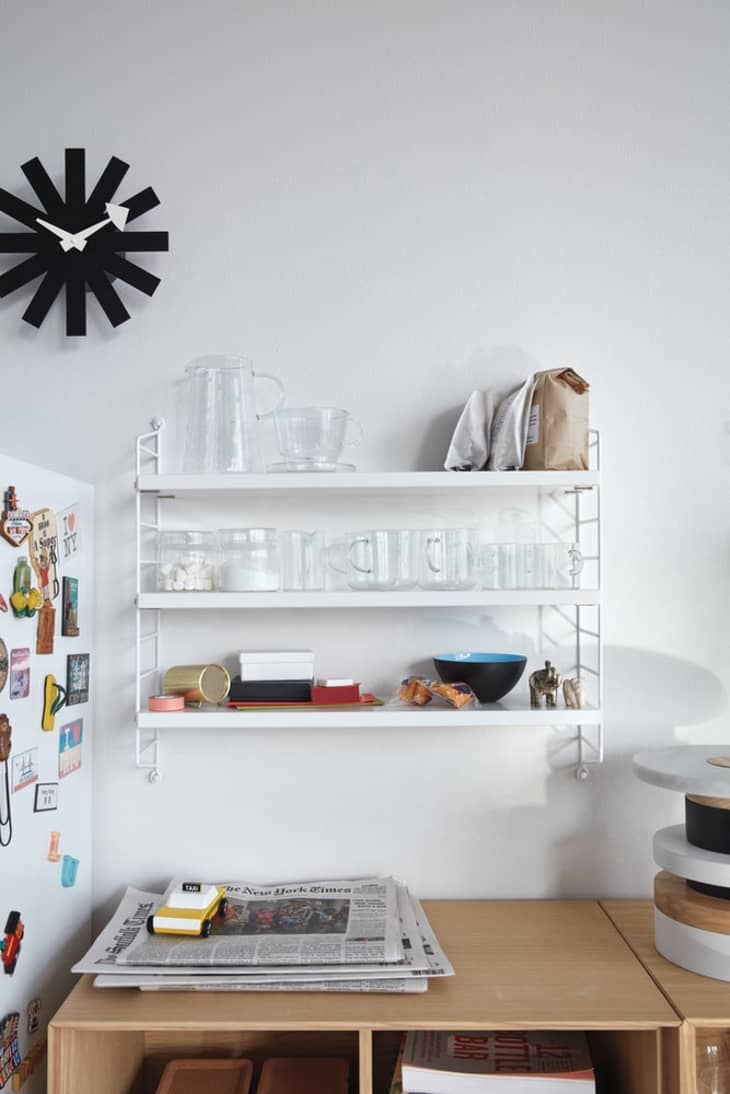 String shelving in a DWR catalog kitchen