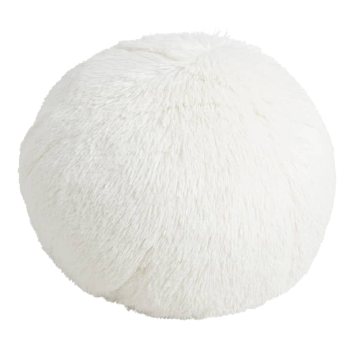 Round white furry pillow