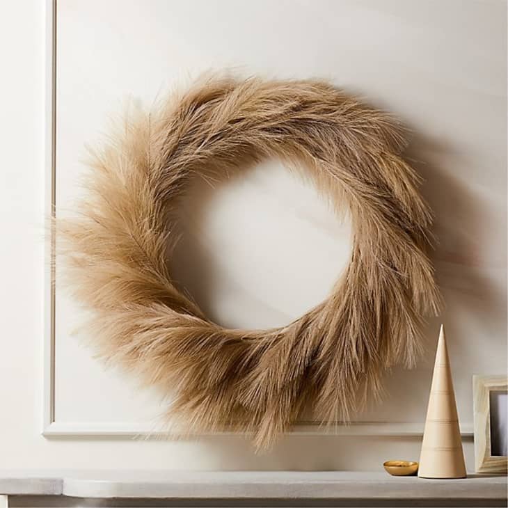 Wreath with taupe-colored grassy tufts