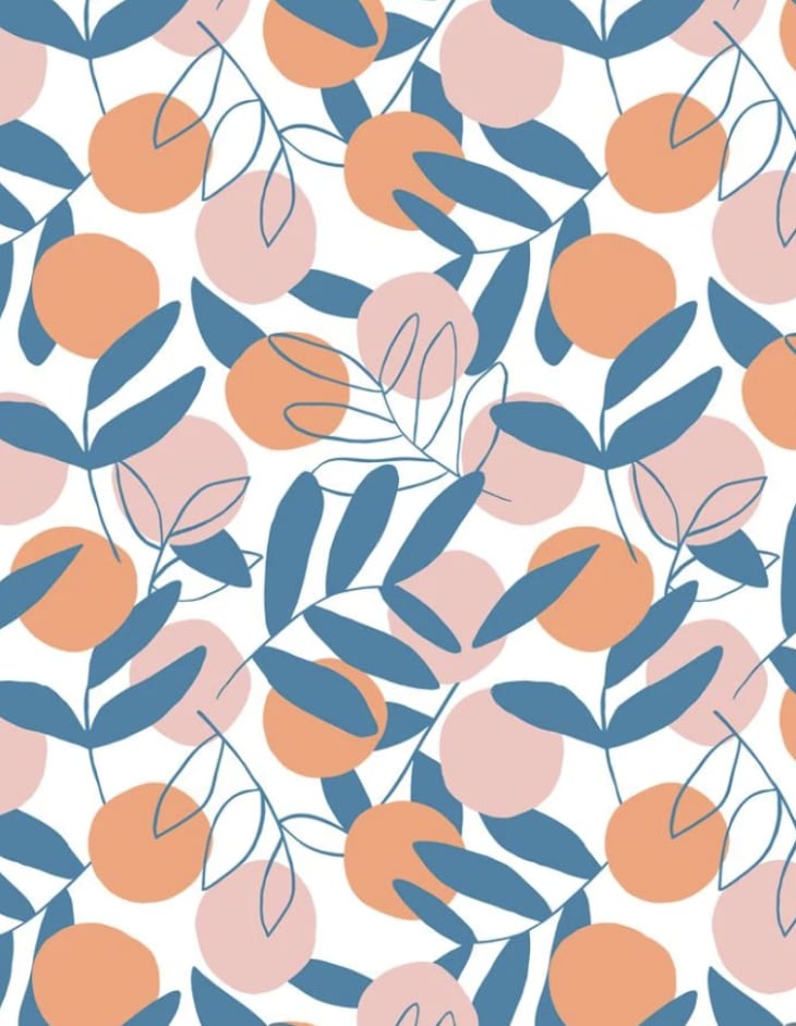 Citrus patterned wallpaper in coral and teal by Wallshoppe