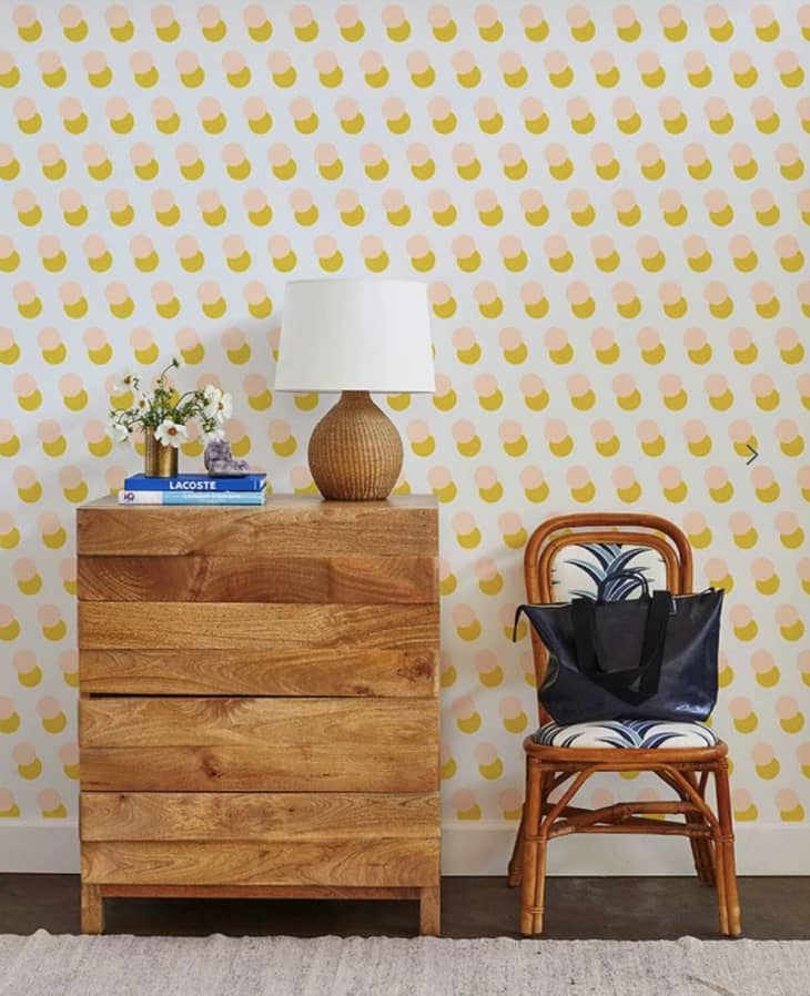 Mod dot wallpaper pattern in marigold and pink from Clare V and Wallshoppe