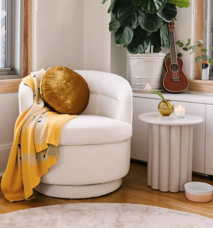 White side table with a tubular base