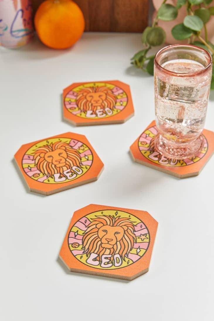 Coasters with zodiac signs on them