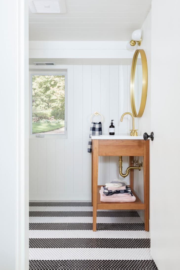bathroom by Max Humphrey with striped tiled floors