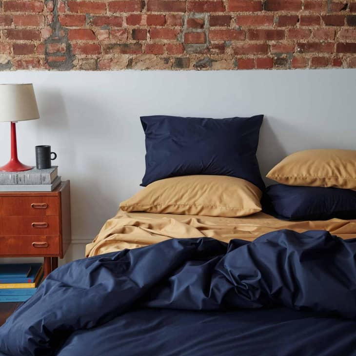 Brooklinen luxe pillowcases in navy and mustard