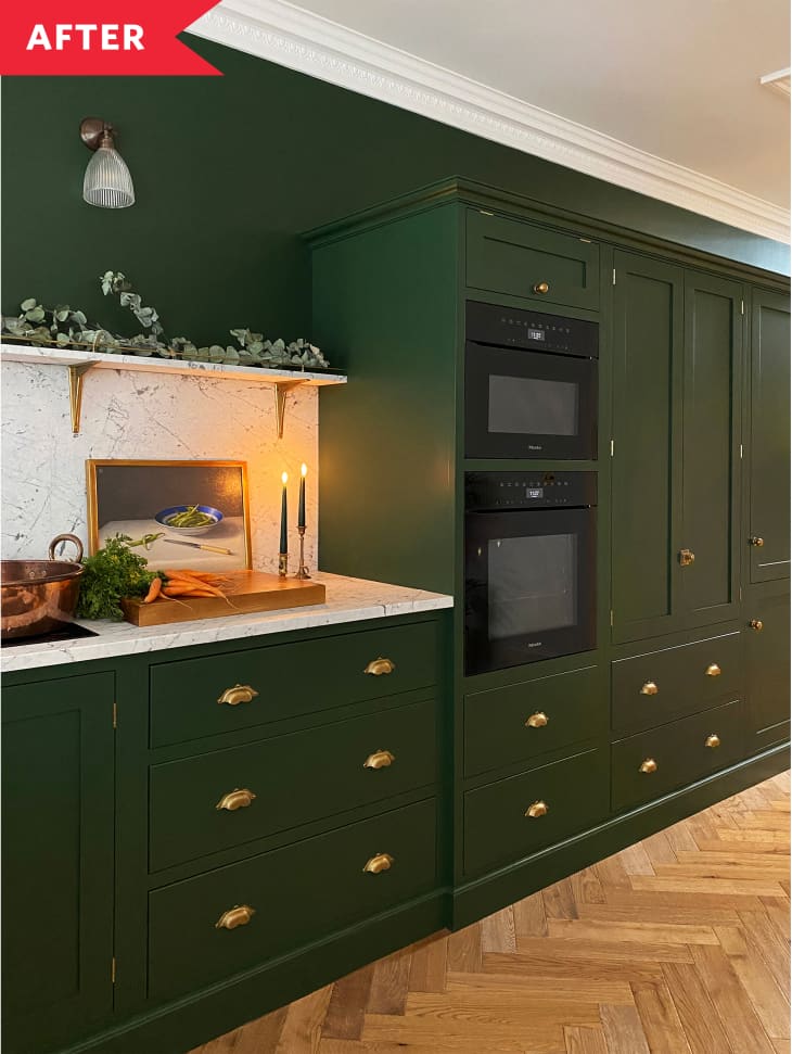 deVOL kitchen after shot depicting a small space green kitchen in a London townhouse