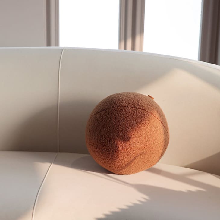 ball pillow in a brown teddy fabric