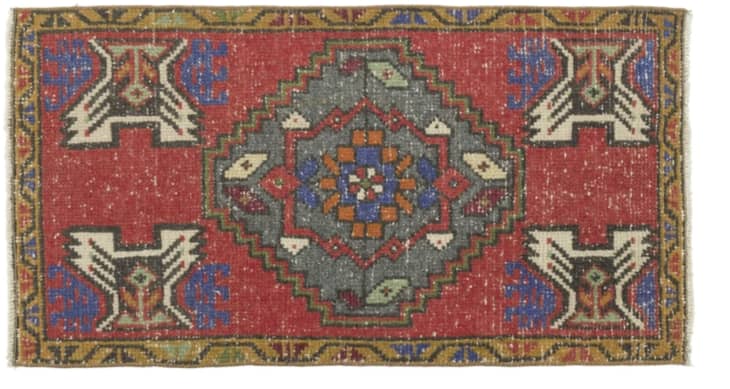 Vintage Turkish rug in reds from Revival Rugs