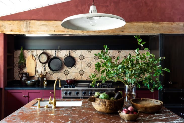 Kirsten Dunst's kitchen in AD with a red stone marble