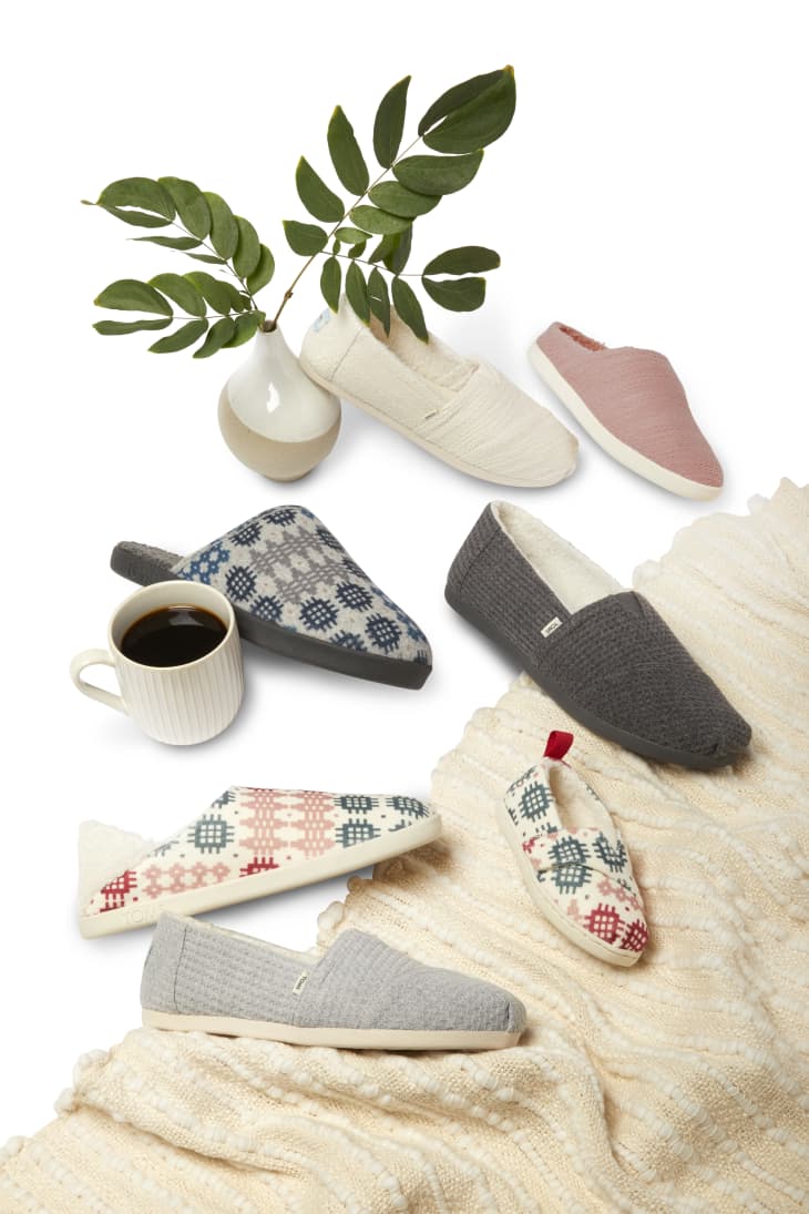 West Elm x TOMS collaboration for 2021 of indoor/outdoor slip-ons and slippers in rose, gray, and a modern Welsh-inspired pattern