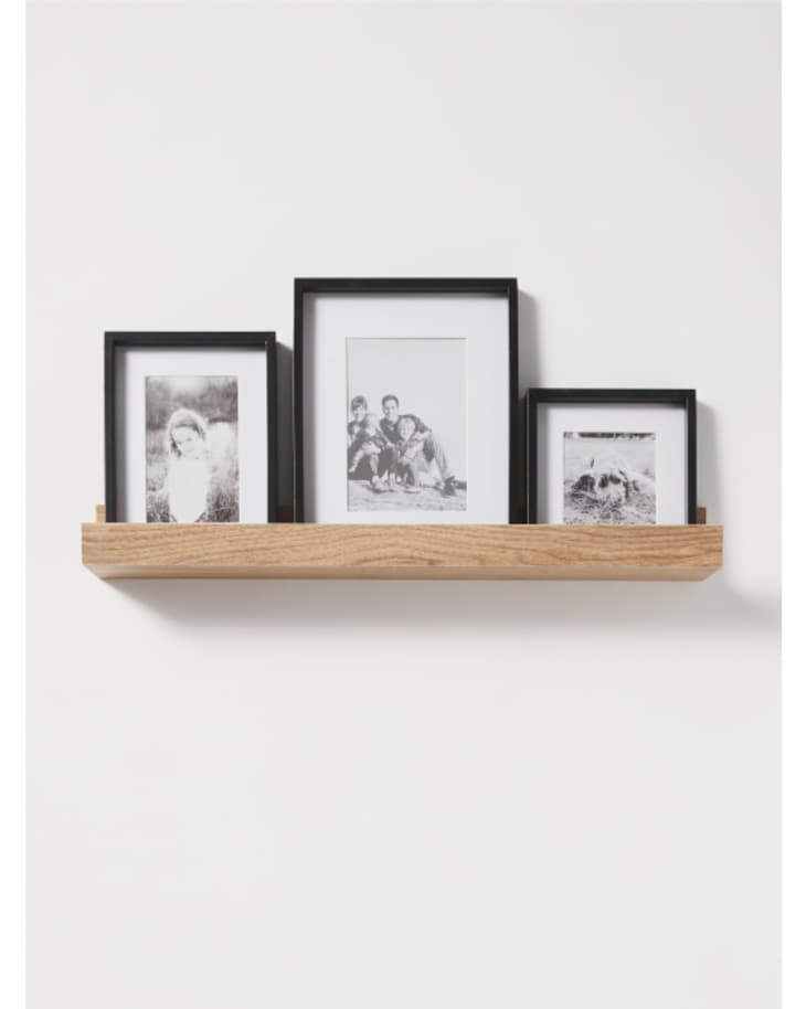 Wooden ledge with three small frames set from HomeGoods