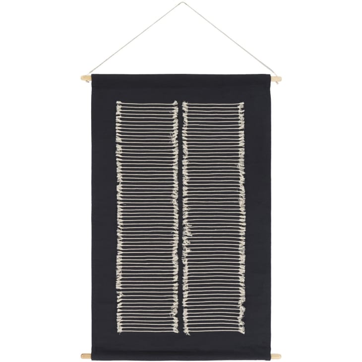 Black wall hanging with white stitching