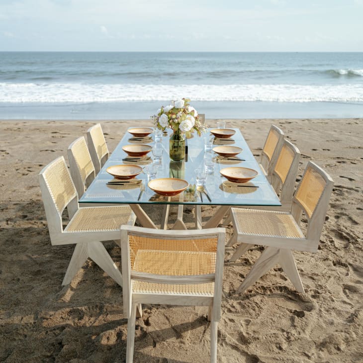 Rattan chairs on a beach