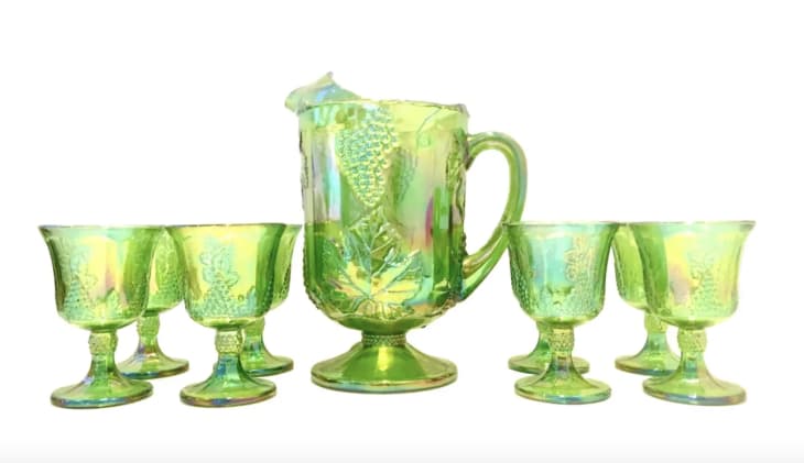 Green carnival glass pitcher and glasses set