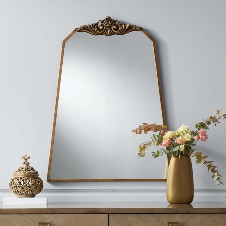 Gilded trapezoidal mirror