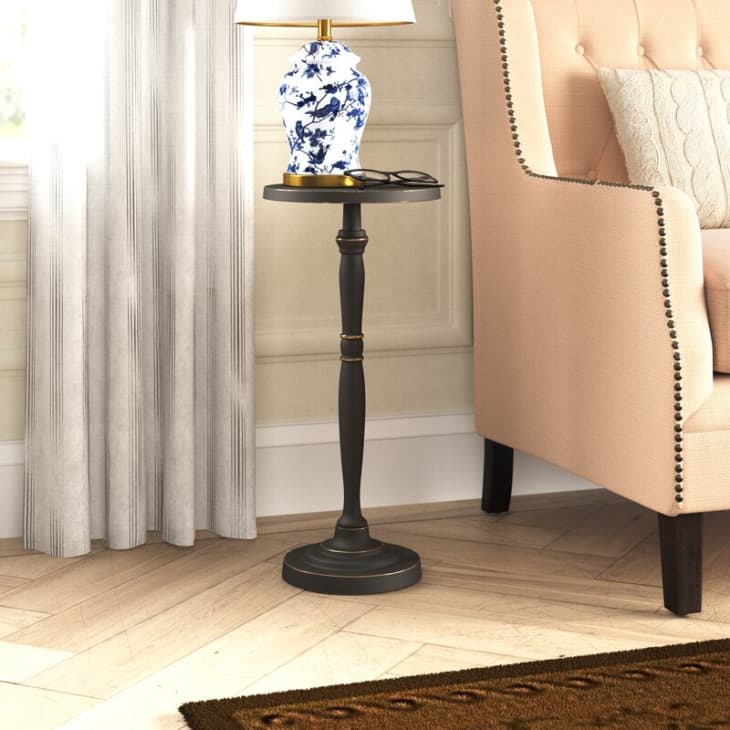 Turned leg cocktail table in brown wood