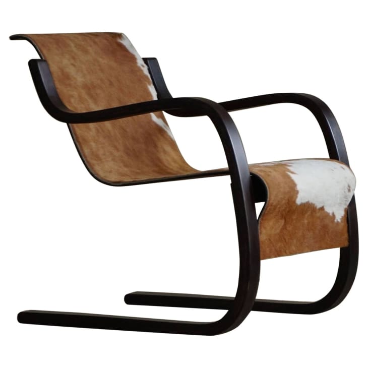 Cowhide curved chair