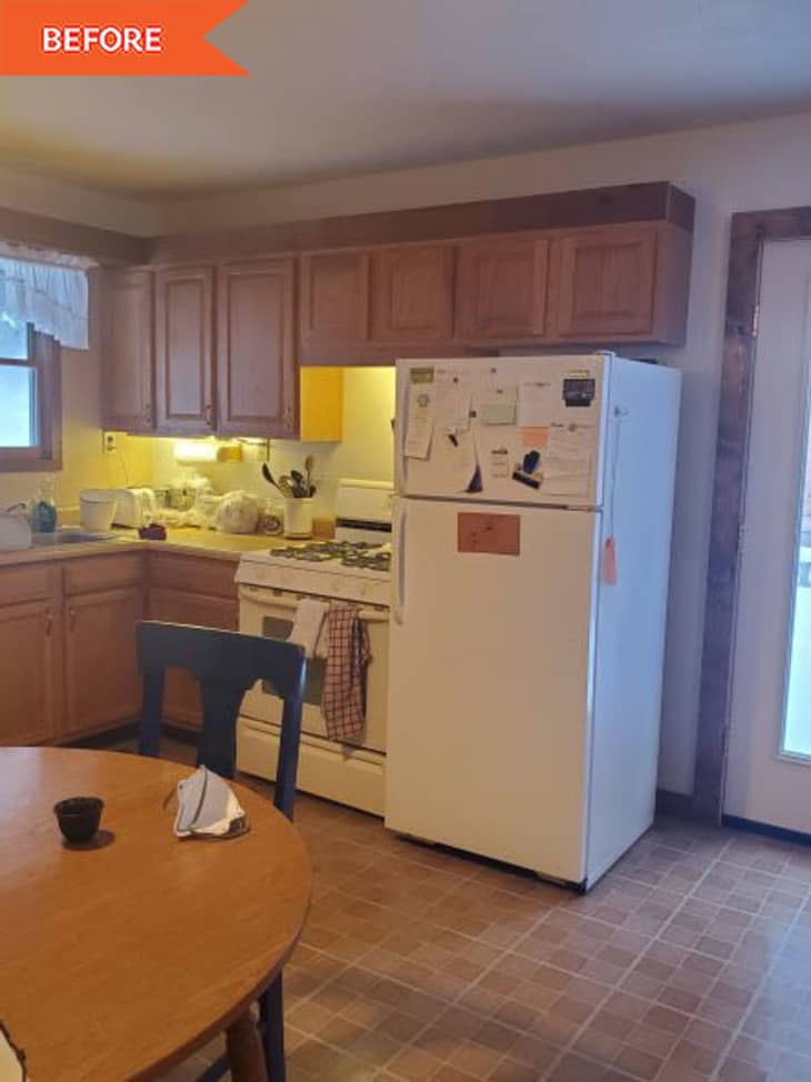 Wooden kitchen with white fridge