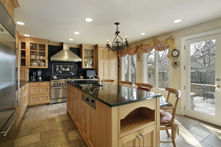 honey colored wood cabinetry in a kitchen