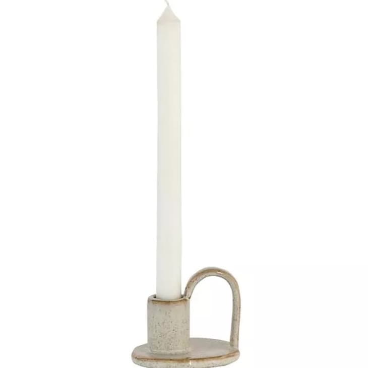 奶油色陶瓷烛台，白色蜡烛