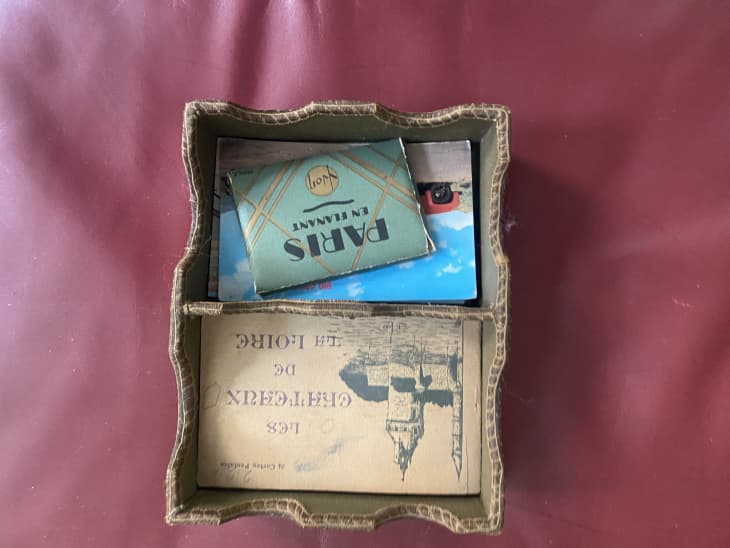 A French fabric display box with Parisian ephemera in it