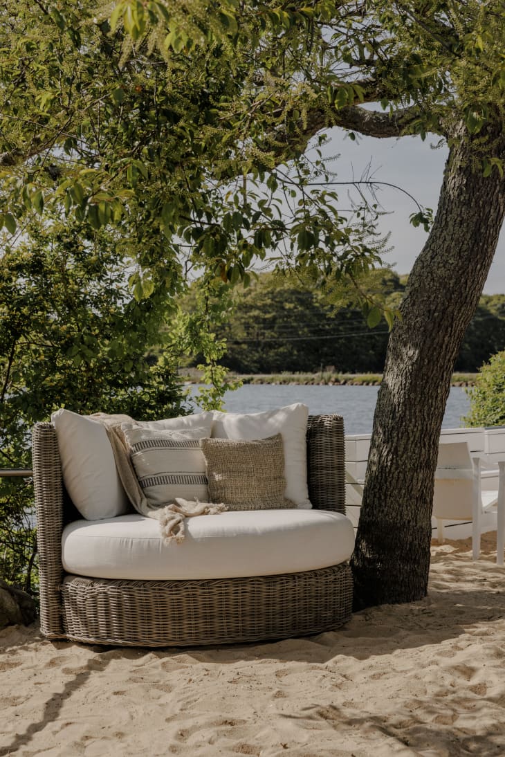 Quiet corner at The Surf Lodge with a sofa from Arhaus under a tree