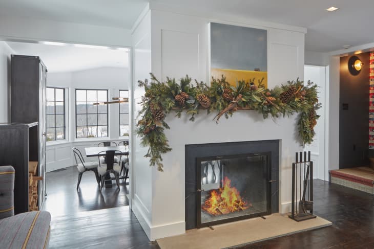 fireplace with christmas greenery decoration
