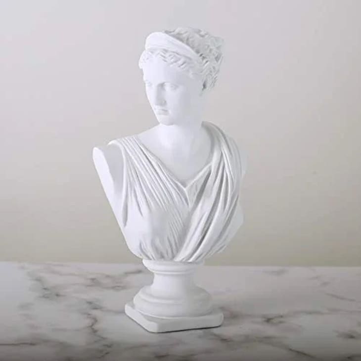 A white Roman bust of Benuoni