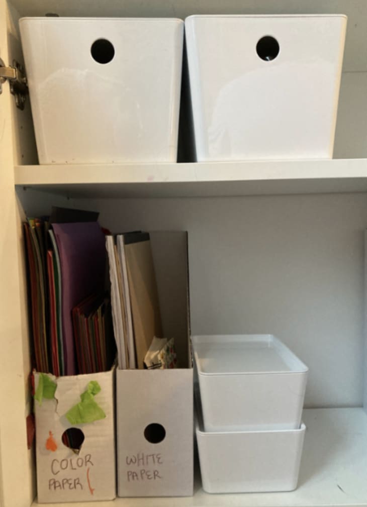 White IKEA KUGGIS bins in Jordan Souza's BILLY bookcase