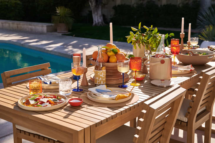 Molly Baz x Crate &amp; Barrel tools launch: outdoor lunch table setup by pool