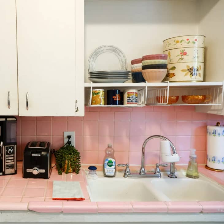 pastel pink backsplash in the kitchen with vintage details