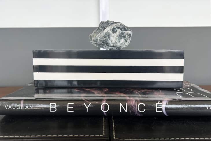 Leather surface with beyoncé coffee table book, rock