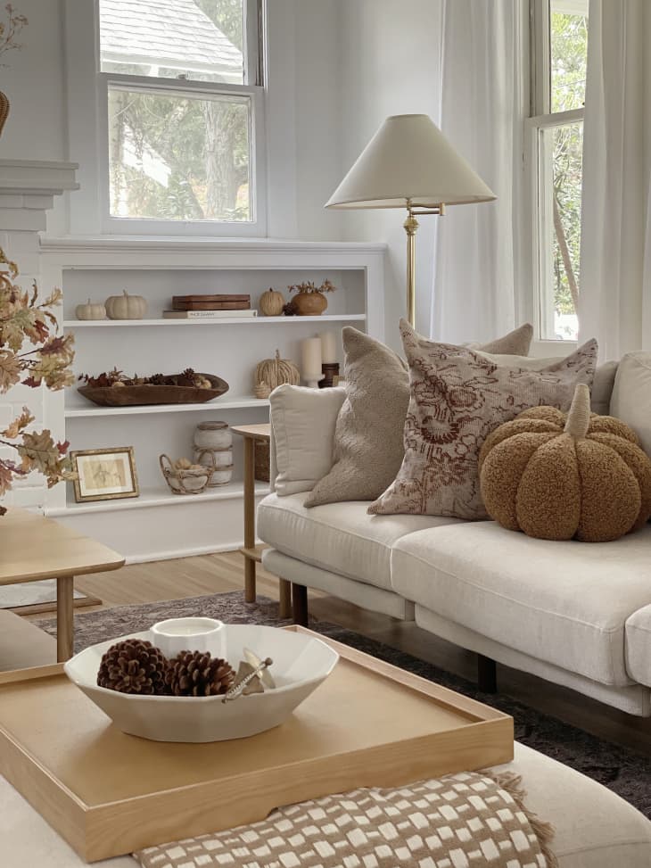 Living room with plush pumpkin on sofa