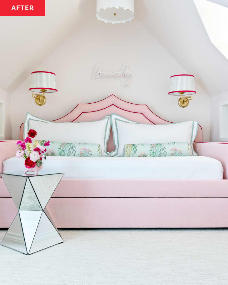 Pink daybed with red piping in teens bedroom.