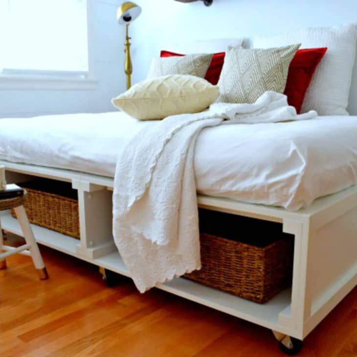 a futon mattress on a DIY platform bedframe