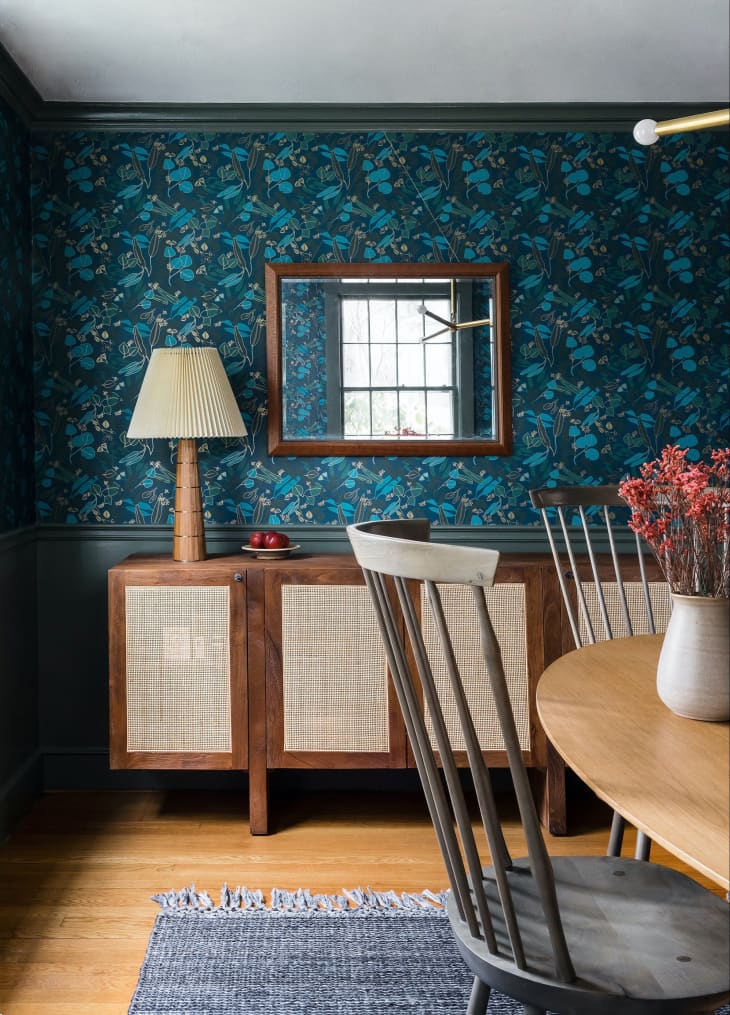 Blue wallpaper in dining room.