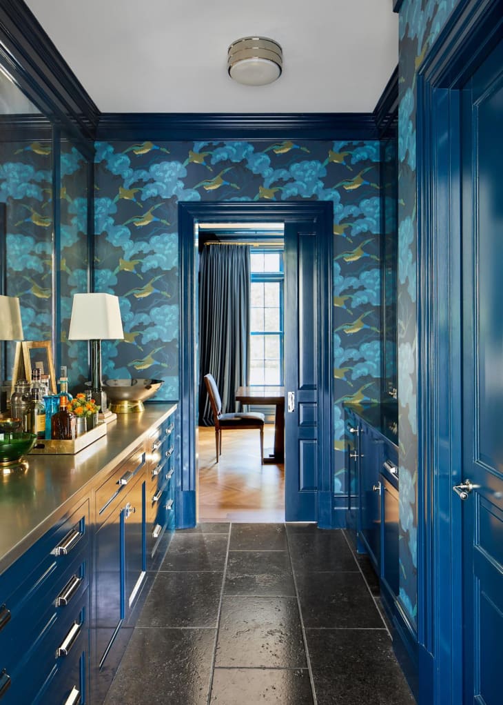 Blue painted trim and cabinets in pantry.
