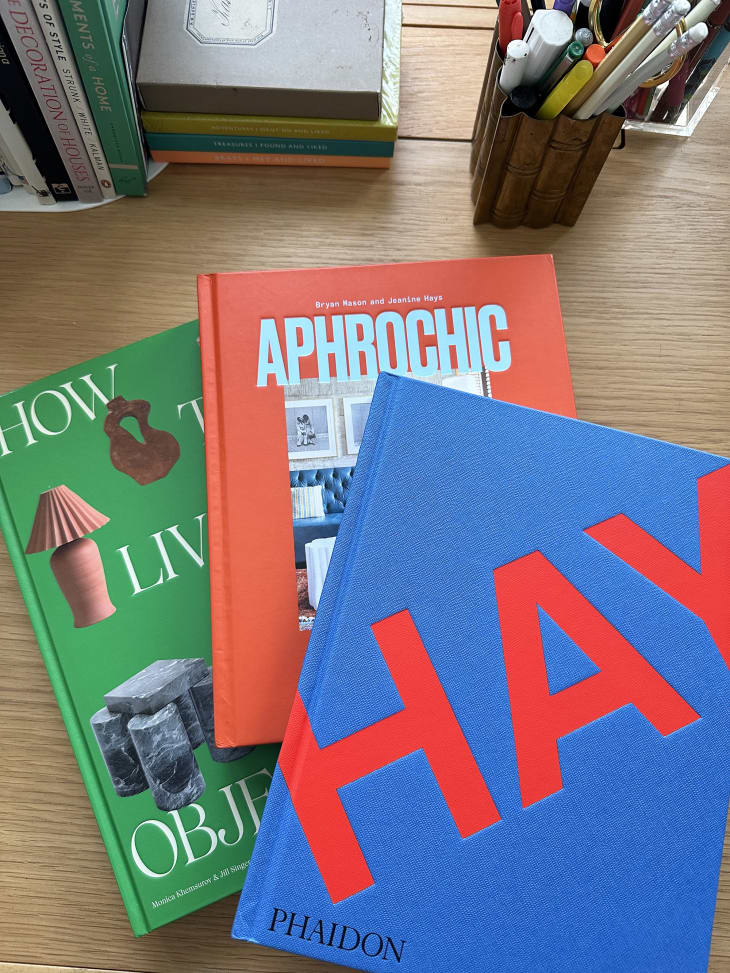 3 home design books on desk