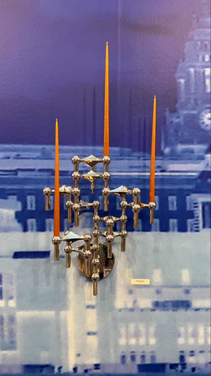 gold dramatic modern wall candle holder at the 2024 Ambiente Trade show in Frankfurt, Germany