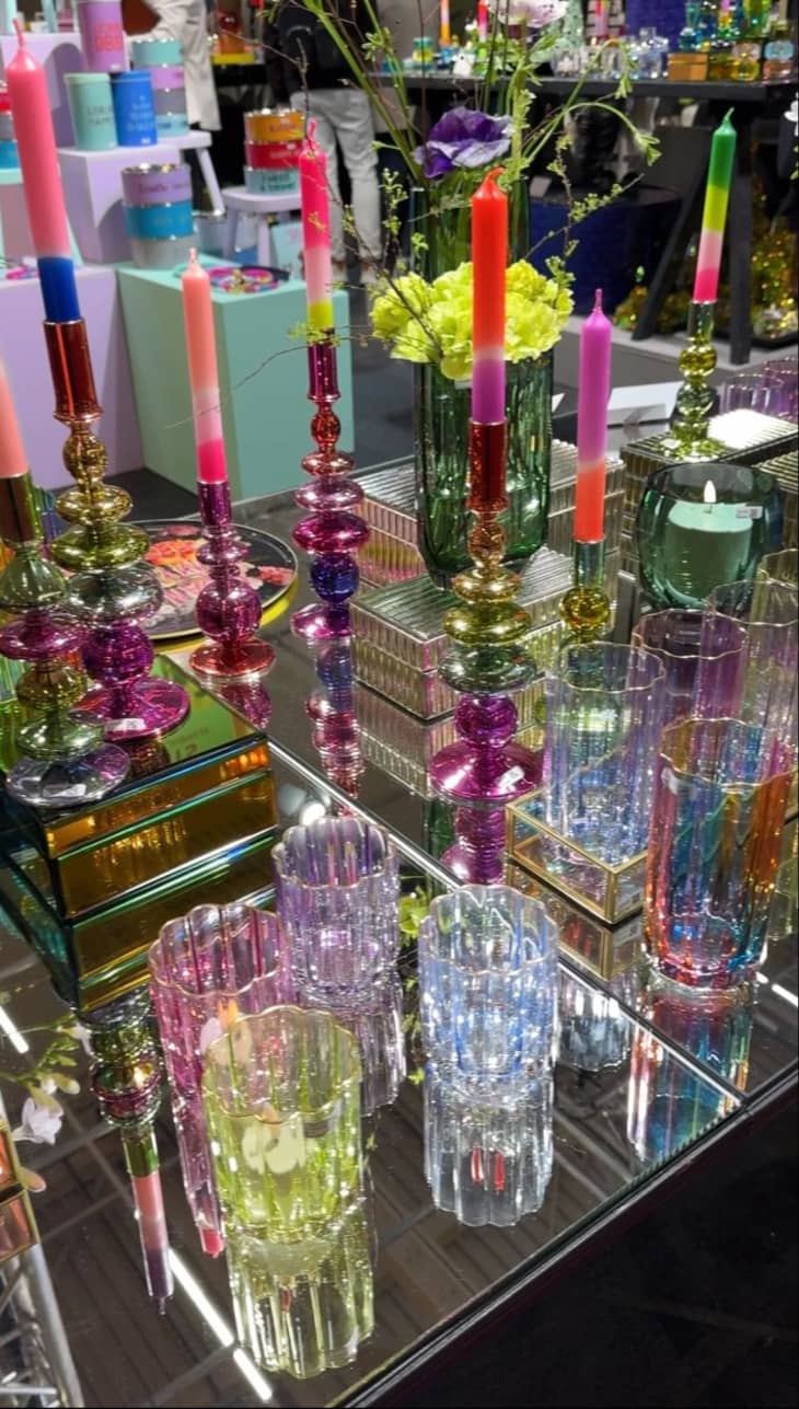 Candle holders, drinkware, and decor in iridescent colors at the 2024 Ambiente Trade show in Frankfurt, Germany