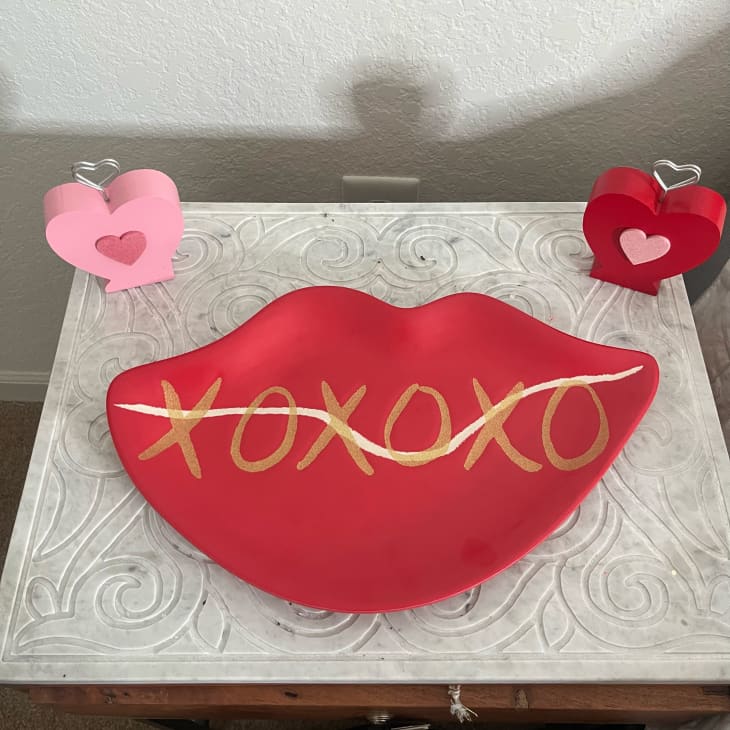 Heart shaped tray on bedside table.