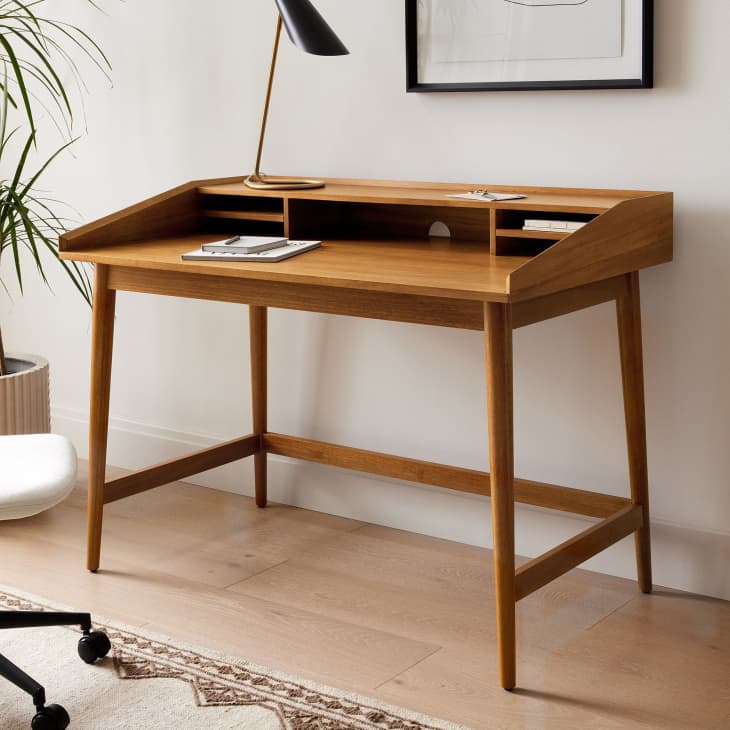 https://cdn.apartmenttherapy.info/image/upload/f_auto,q_auto:eco,w_730/at%2Fstyle%2Fwest-elm-mid-century-writing-desk